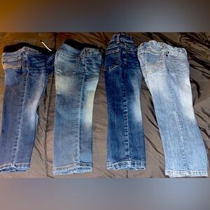 Four pairs of kids jeans size 4T